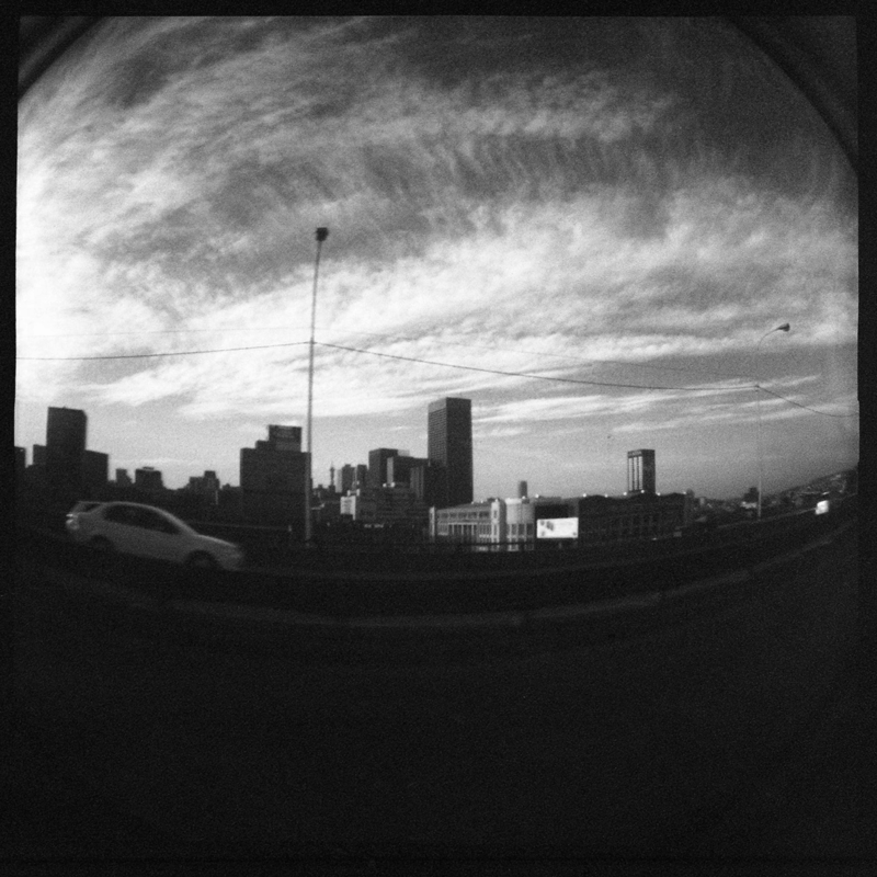 Photograph of Johannesburg skyline taken while the Bean Team were driving on the highway. Photograph by Mohit Sooka